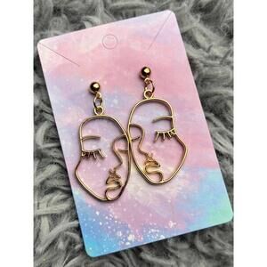 face portrait earrings